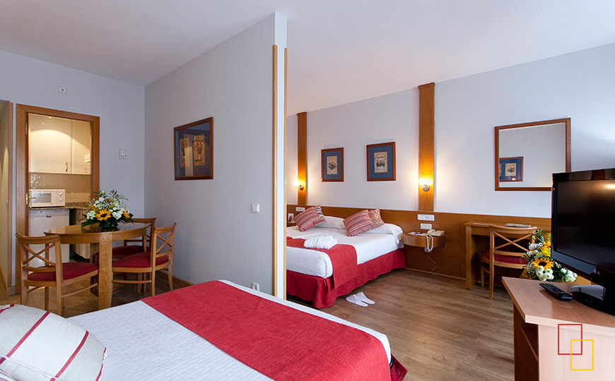 Apartamento triple con salón