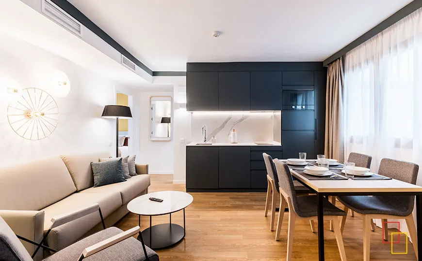 Salón y cocina - Apartamentos Lumbreras 16